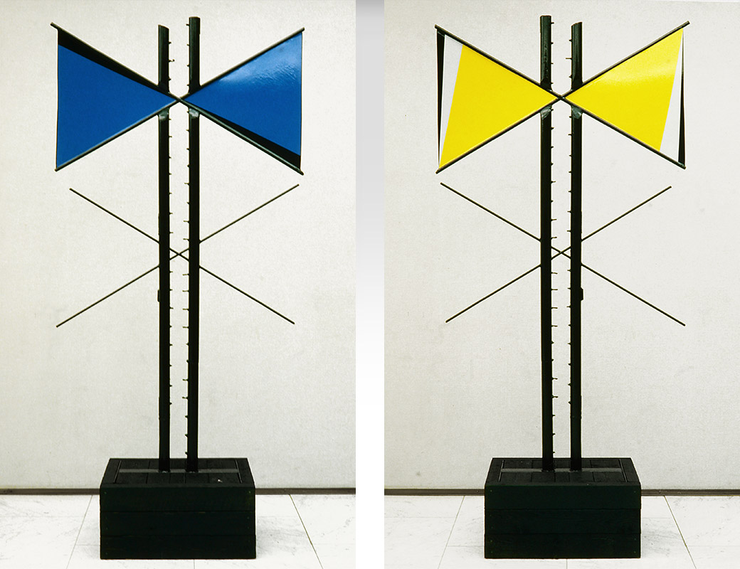 Ilppo Alho, 1983 — Veistos — maalattu ter�s ja puu — 240 x 110 x 50 (cm)